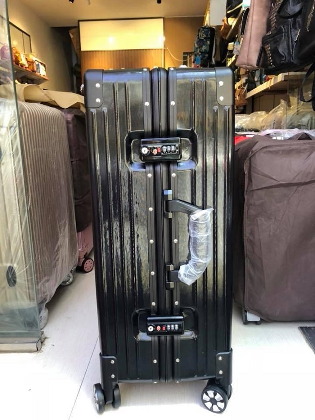 Nên mua vali du lịch khóa kéo hay vali khóa sập?
